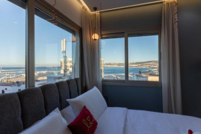 Marina View Residence Luxurious Studio Retreat with Stunning Ocean Views 1 Double Bedroom, 1 Convertible Couch